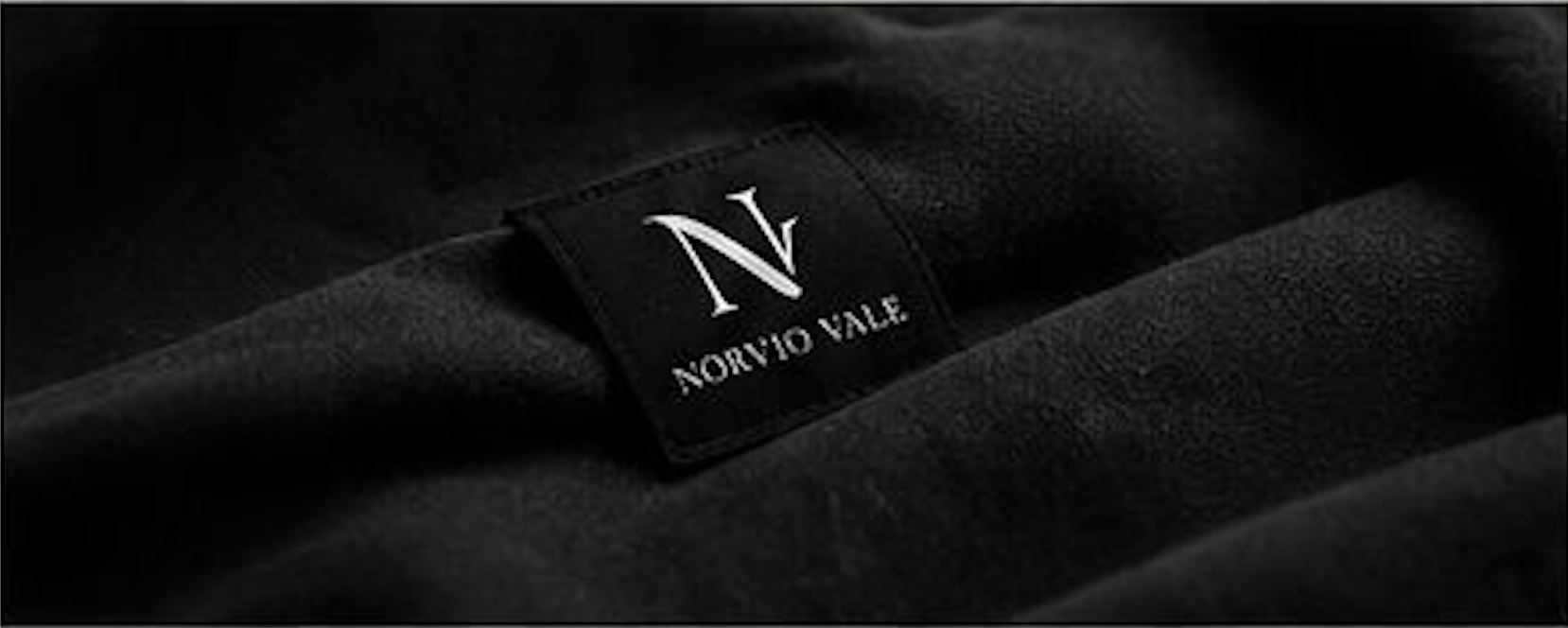 Norvio Vale woven label detail on premium fabric