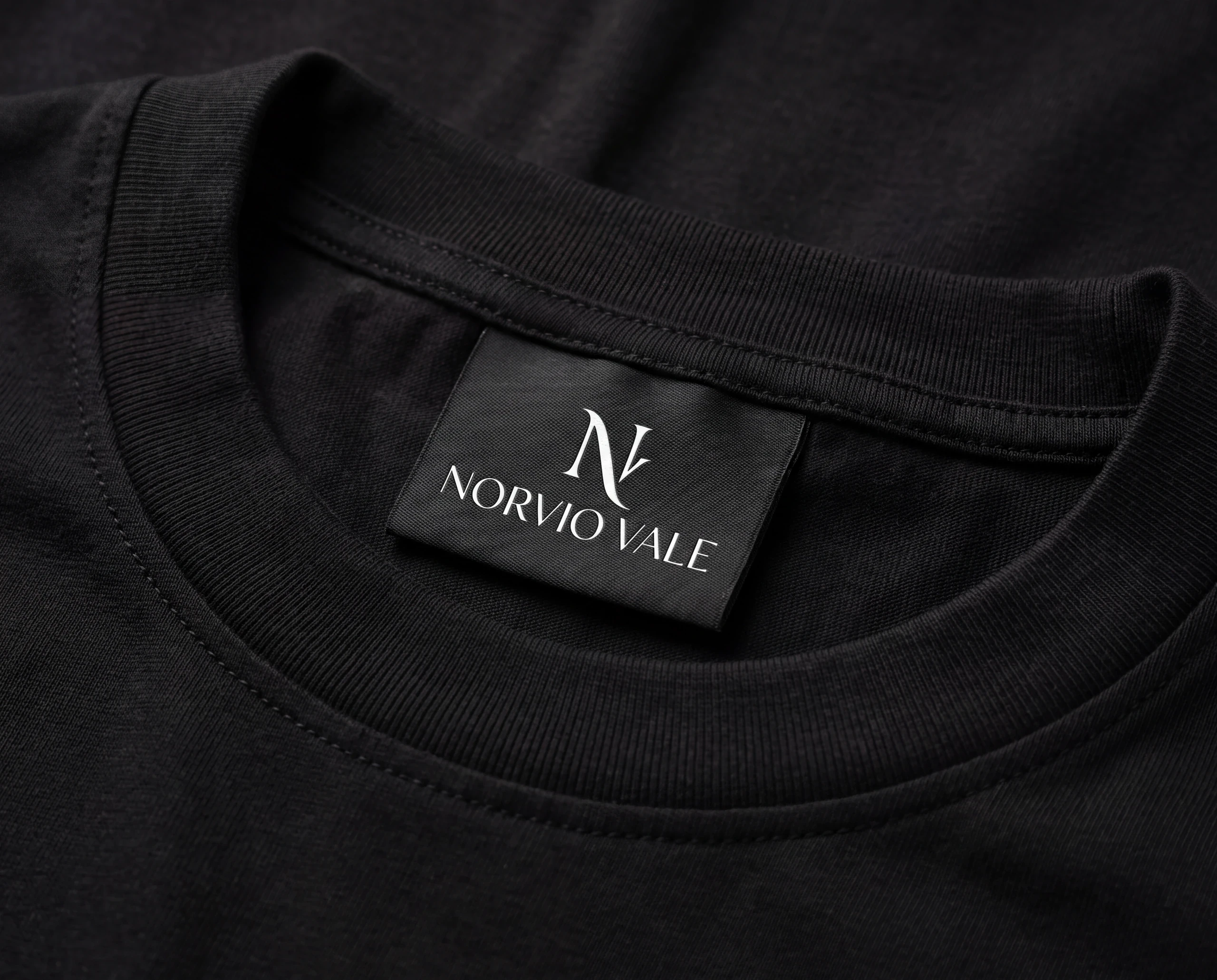 Norvio Vale woven label detail on premium fabric